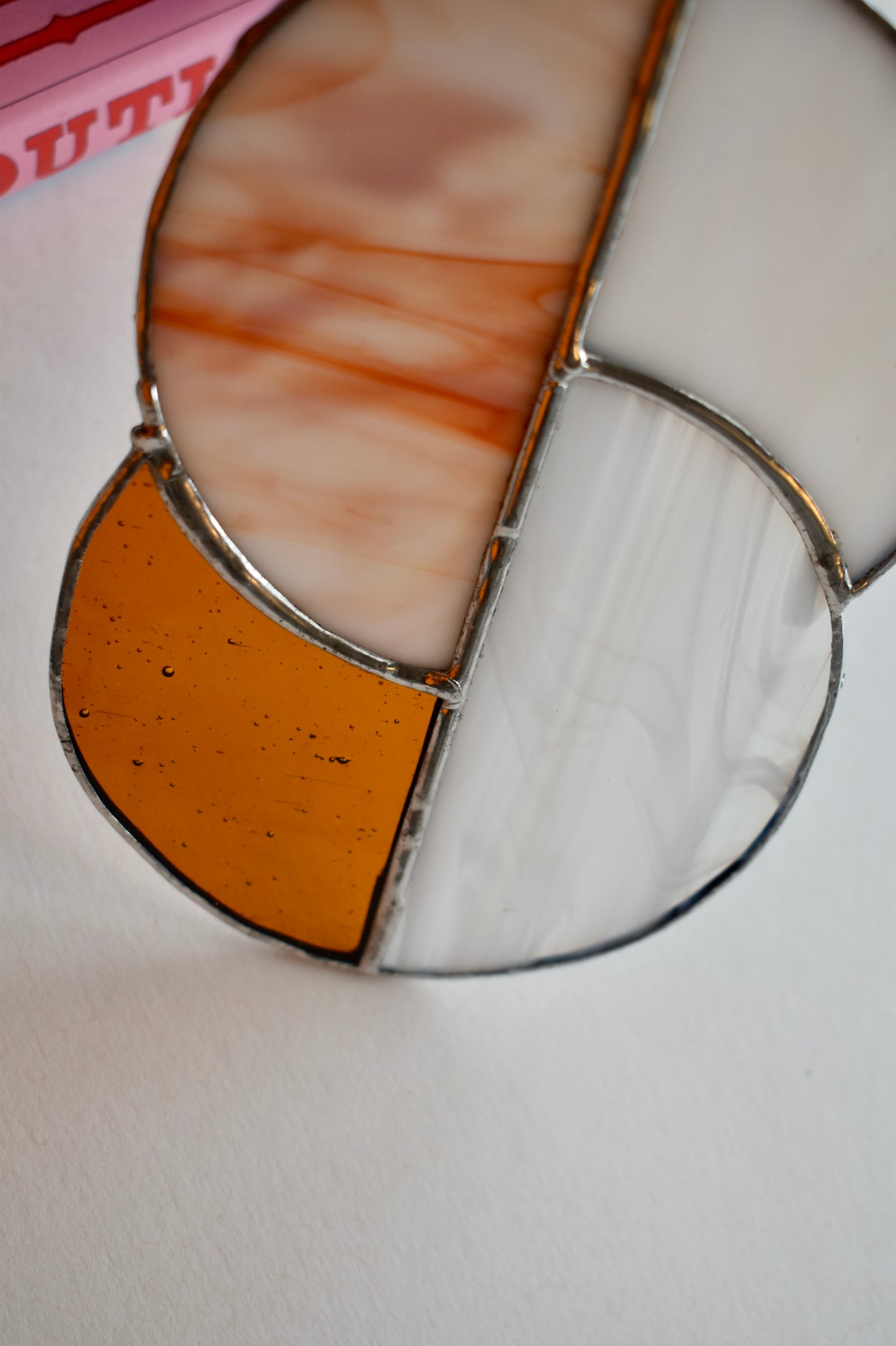 Harvest Glow Stained Glass Sun Catcher – White & Orange Half Circle Design